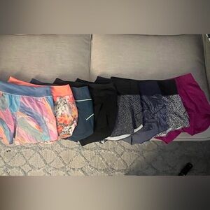 8 pairs of Athleta Running Shorts